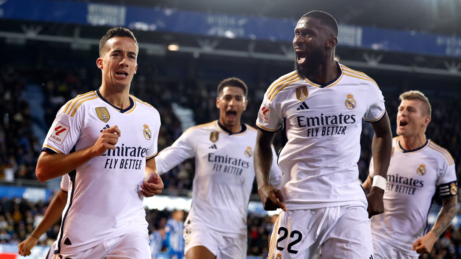 Real Madrid, with a 10-man squad, secures a last-minute victory against Alavés, propelling them to the top of La Liga as they head into the Christmas break.