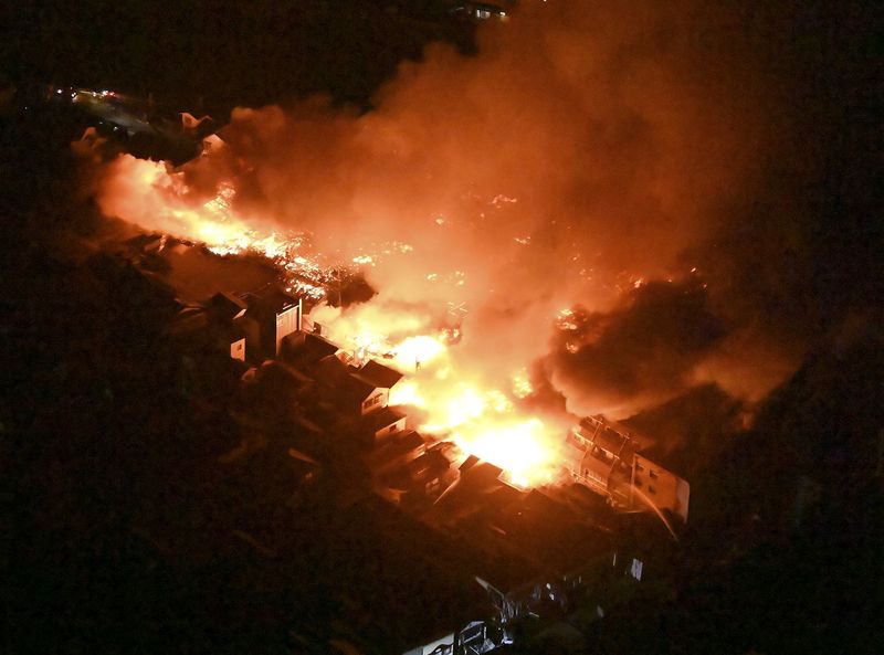 A strong earthquake shakes Japan, prompting the evacuation of nearly 100,000 residents.